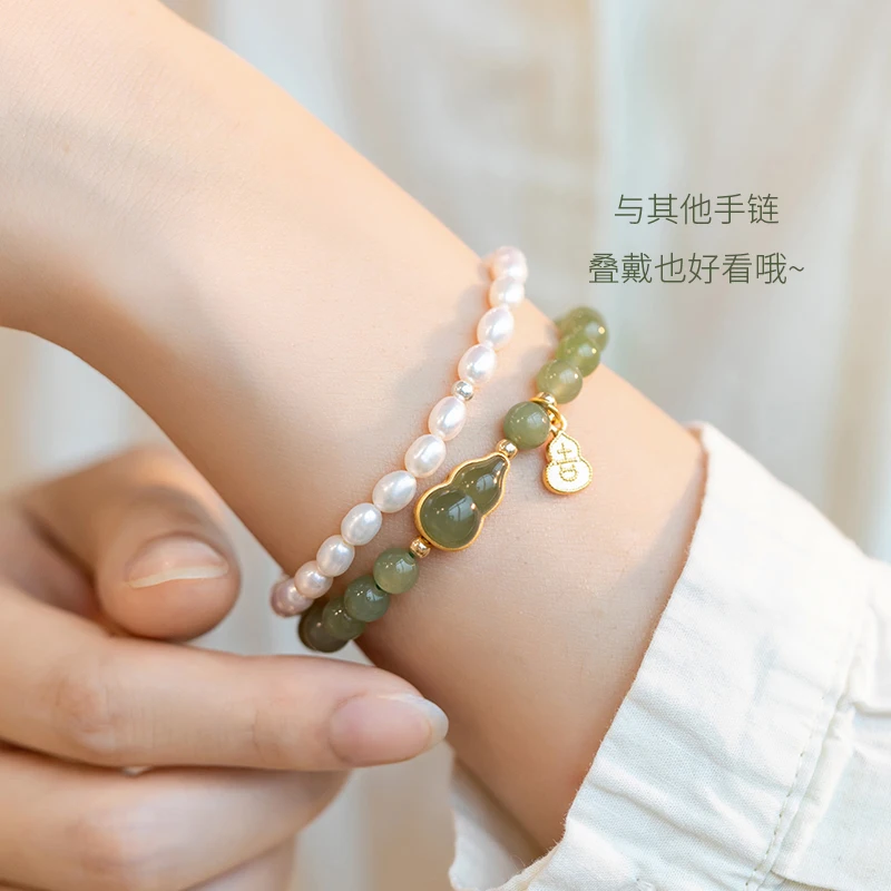 Optimized beaded bracelet for women, featuring a lucky golden gourd with jade inla  in a fresh sweet  and ethnic style