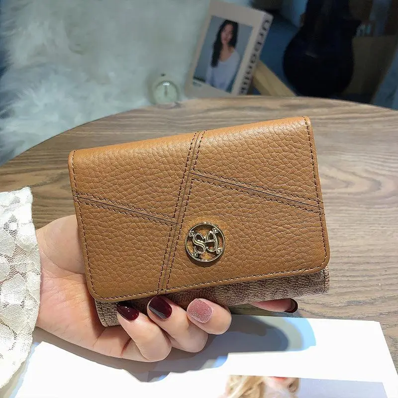 nouveau-portefeuille-court-en-cuir-veritable-pour-femme-hong-kong-2026-–-porte-monnaie-multi-cartes-pliant-en-trois-ou-en-deux-compact