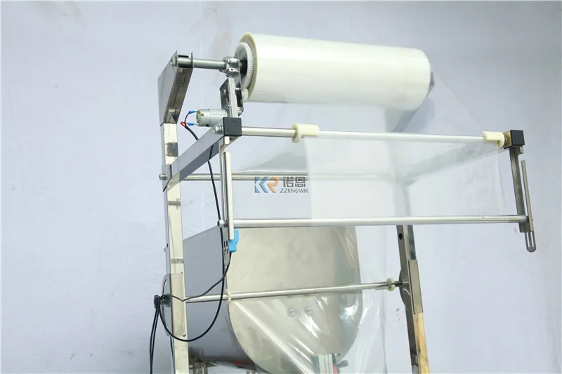 Confezionatrice automatica per pesatura di spezie per cereali Macchina confezionatrice per alimenti croccanti per latte di soia Riempimento di arachidi, pistacchio, anacardi