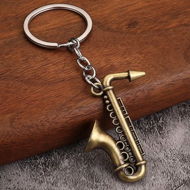 Creative Mini Saxophone Keychain Music Lover Gift Personalized Mini Metal Keyring Pendant for Car Accessories Small Musical Toys