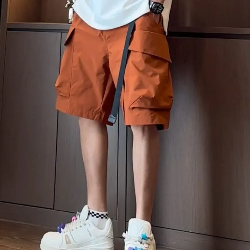 

Мешковатые мужские шорты-карго с несколькими карманами, широкая эластичная талия и шнурком, однотонные свободные короткие брюки для мужчин, японский уличный стиль