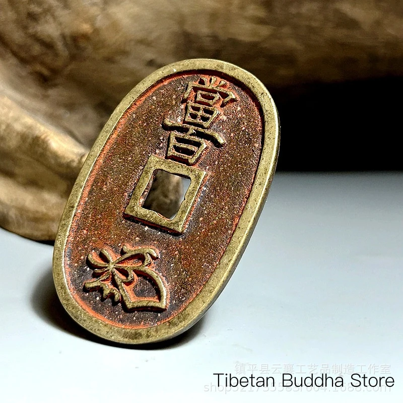 Cinnabar brass coin, Tianbao Tongbao, antique-style coin, cast using sand casting, with cinnabar patina, aged oval-shaped copper