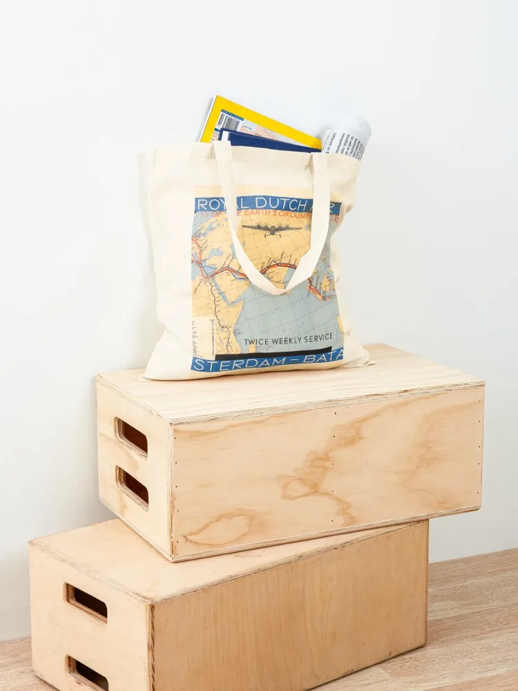 1934 ملصق عتيق. KLM الخطوط الجوية الملكية الهولندية Amsterdam-Batavia الخدمة الأسبوعية. حمل حقيبة