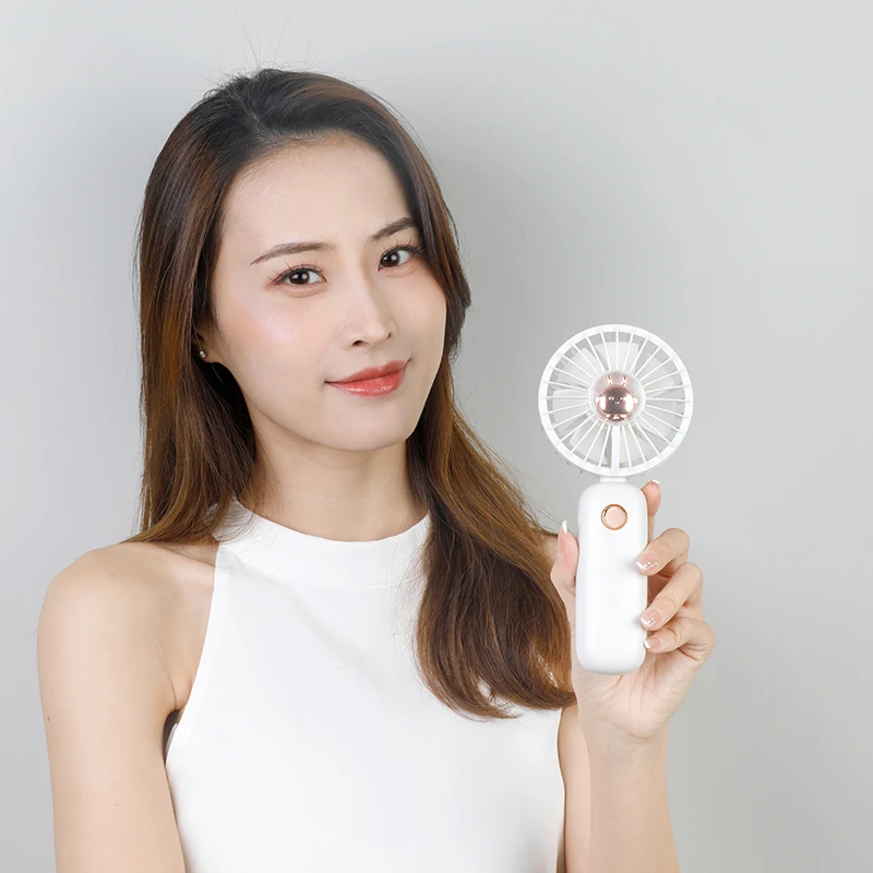 الجملة 1200 مللي أمبير مروحة صغيرة محمولة وحامل الهاتف الذكي قاعدة طاولة قائمة تعمل بالبطارية للاستخدام المنزلي للسيارة والمنزلية