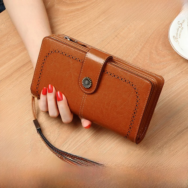 portefeuille-long-en-cuir-pour-femme-design-ajoure-porte-monnaie-style-minimaliste-et-tendance-sac-a-main-durable-en-cuir-de-vachette-nouvelle-collection-ete-2026