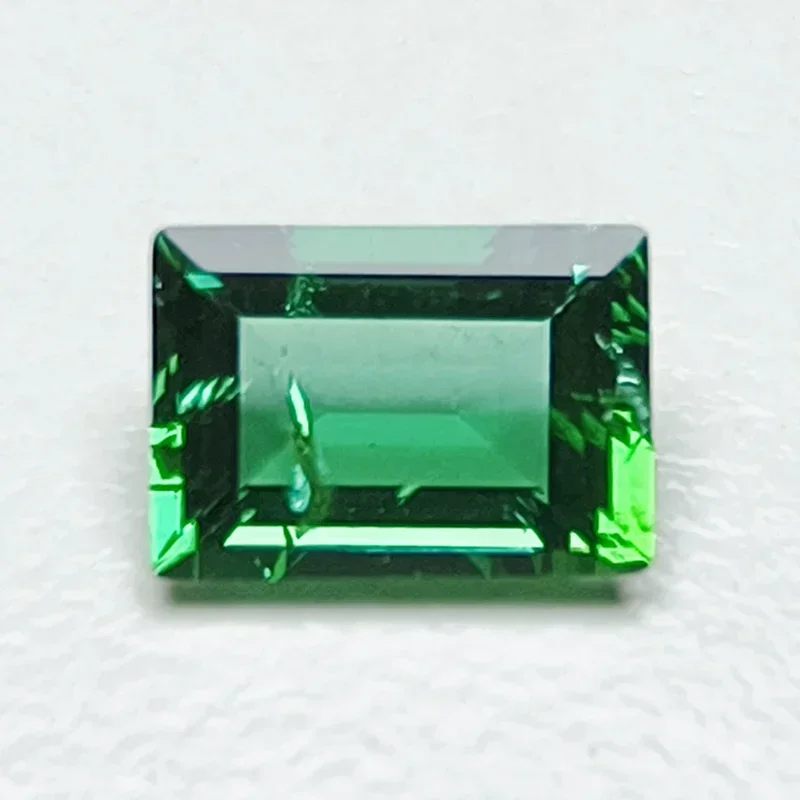 

Lab Grown Zambian Emeralds Rectangle Shape Hydrothermal Hand Cutting with Cracks Inclusions Inside Selectable AGL Certificate