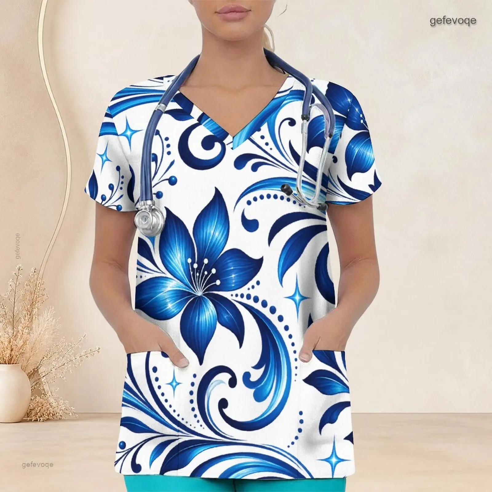 Women V Neck Short Sleeve Printed Teal Blue Gold Accent Floral Scrub Top with Front Pockets