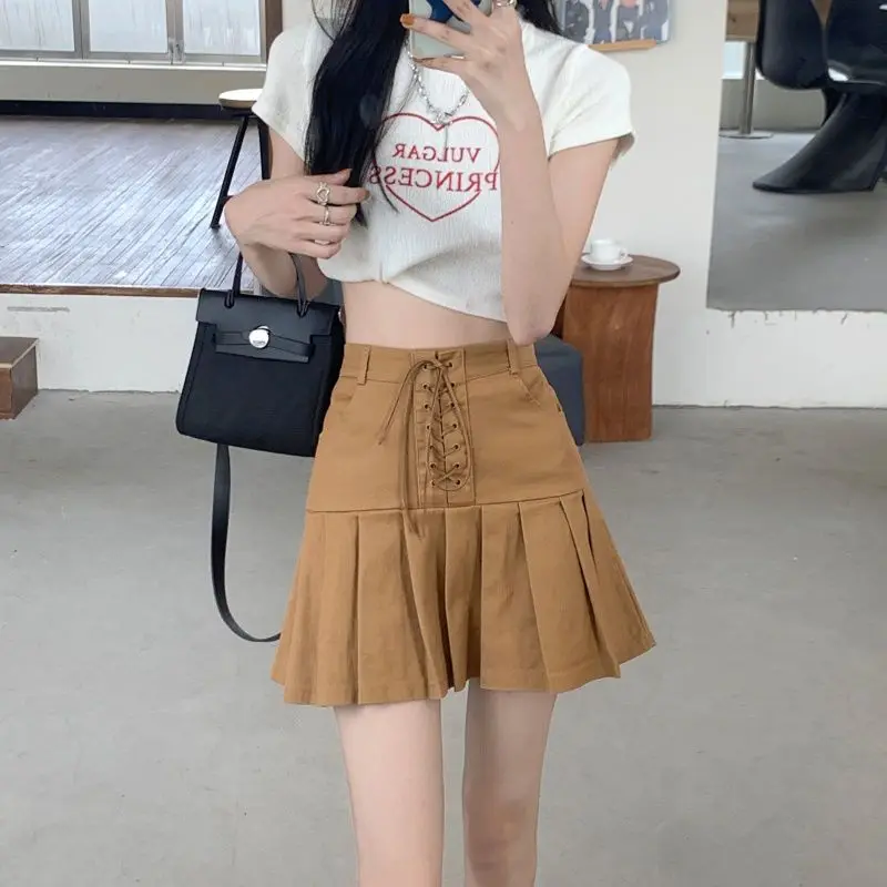 Fashion Solid Color Bandage Pleated Skirts Female Clothing 2025 Summer New Loose Preppy Style Zipper High Waist Mini Skirts