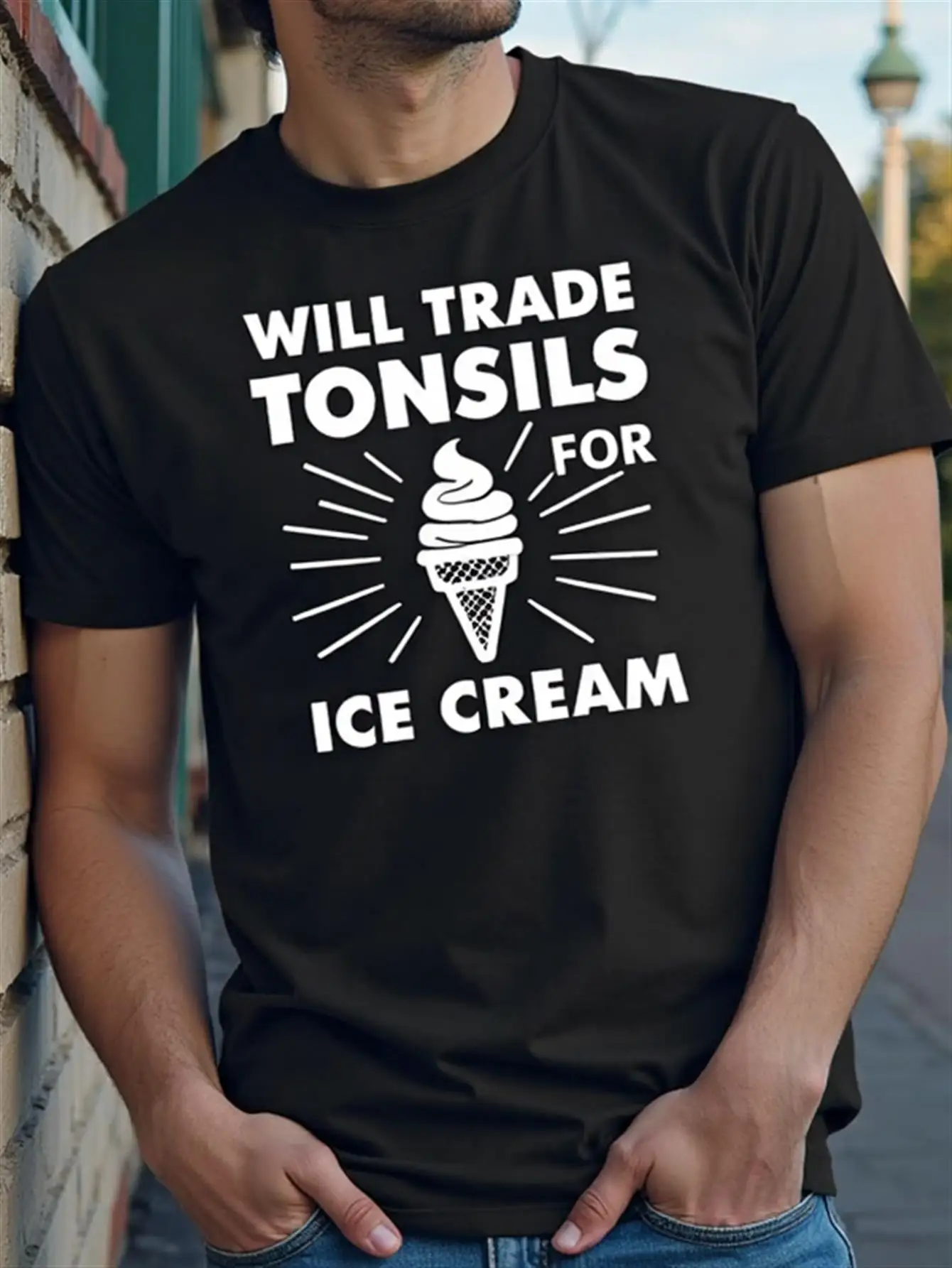 

T-Shirt with Funny Slogan: I'D Trade My Tonsils for Ice Cream. Soft Pure Cotton Black T-Shirt with Ice Cream Cone Design. Suitable for Birthday Parties, Everyday Wear, and as a Gift for Ice Cream Shops. Machine Washable, Fun Clothing for Food Lovers