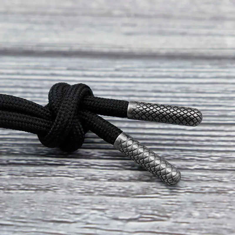 Coolstring 22.3 CM * 5.6 MM Punte di pizzo in lega di zinco Olio Swarthy Nero Sneaker Puntali in metallo Corda sportiva Decorazione Rastaclat