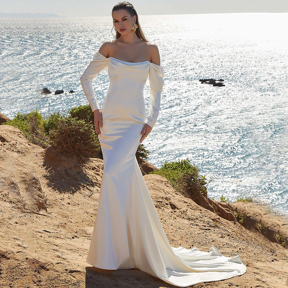 Gorgeous Mermaid Wedding Dress Off the Shoulder Long Sleeves Floor Length with Buttons Sexy Backless Bridal Custom Made Gowns