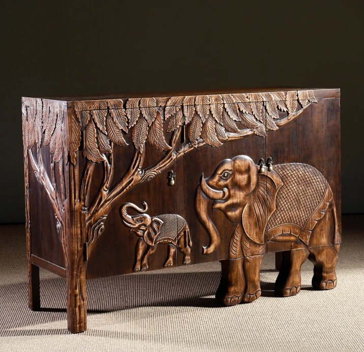 

Vintage solid wood relief elephant Southeast Asian living room and foyer decorative cabinet