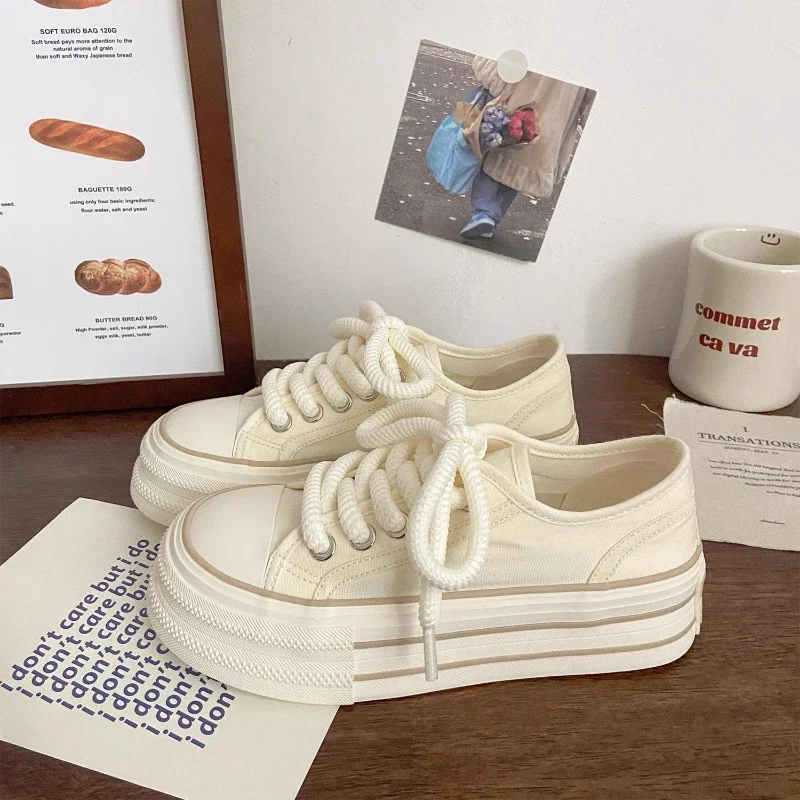 Cream colored canvas shoes for women. Thin spring, summer, and autumn styles. New trend Korean casual canvas shoes for women