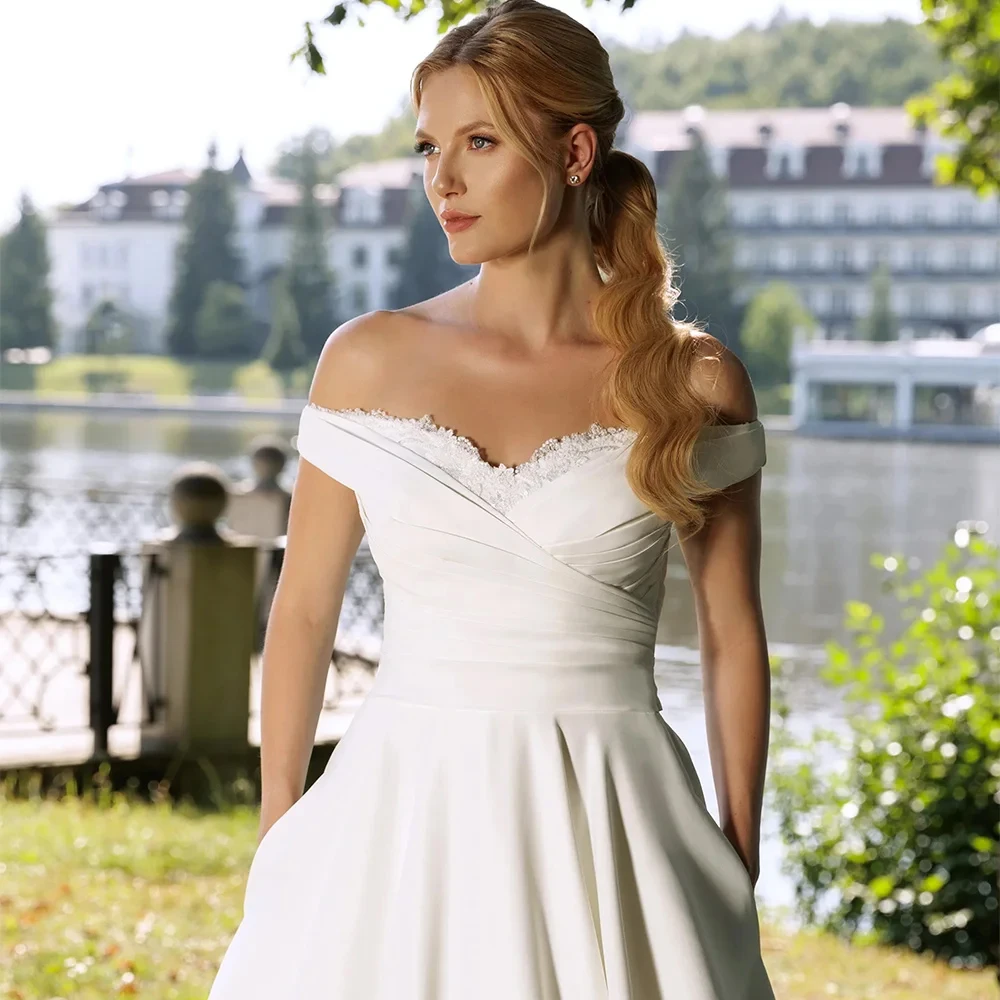 Exquisite A-Linie Brautkleider Ärmellos Elfenbein Spitze Brautkleider Gericht Zug Vestido De Novia Exquisite Neue Robe De Sommer