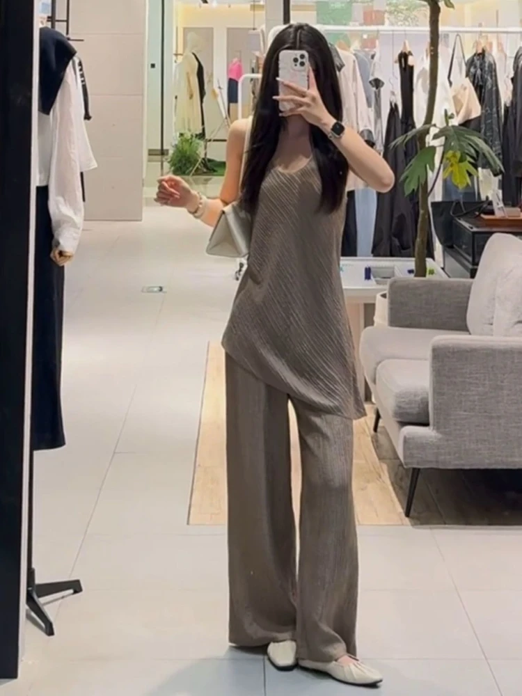 

Новый модный летний повседневный комплект-двойка 2026 года для женщин: свободный асимметричный жилет + брюки с высокой талией, прямые широкие штанины