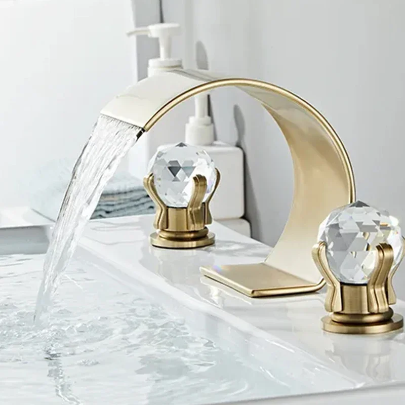 Hot selling high end luxury 3 Holes Waterfall wide bathroom faucet Gold Brass Wash Basin Faucet with Double Crystal Handle