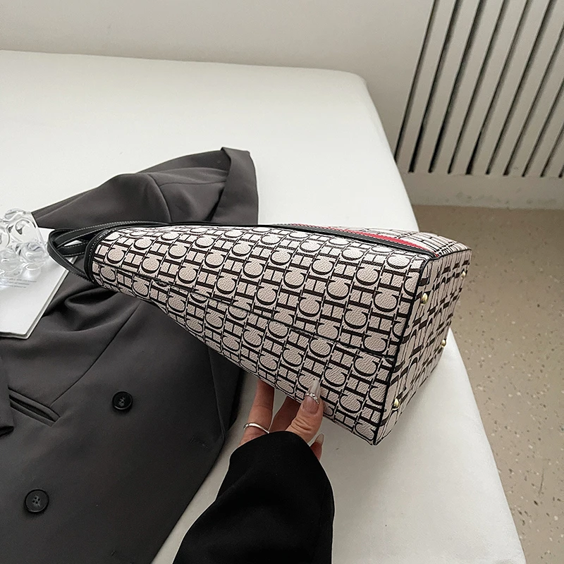 Luxury women's zipper shoulder bag, fashionable classic large capacity shopping bag, creating a daily exquisite style