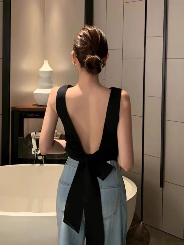 Clothland Women Sexy Sleeveless Blouse Backless Bow Tie Short Style Crop Top Female Chic Shirt Mujer WA259