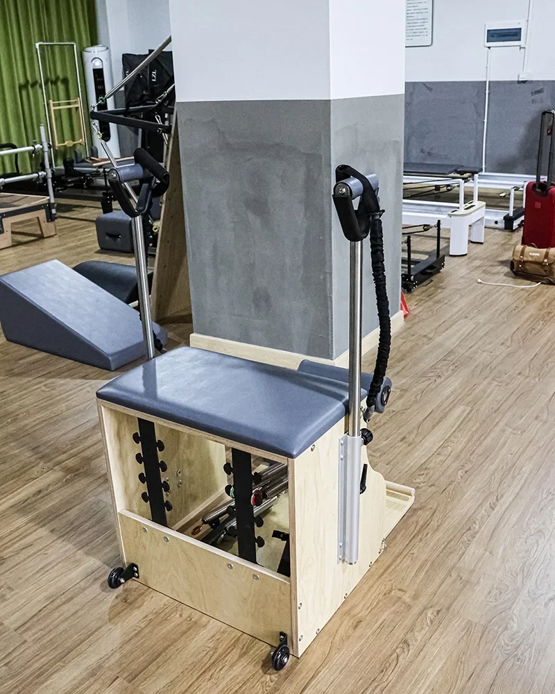 America Yoga Studio Use Spring Steel Base Wunda Stability White Maple Wood Yoga Pilates Combo Chair For Sale