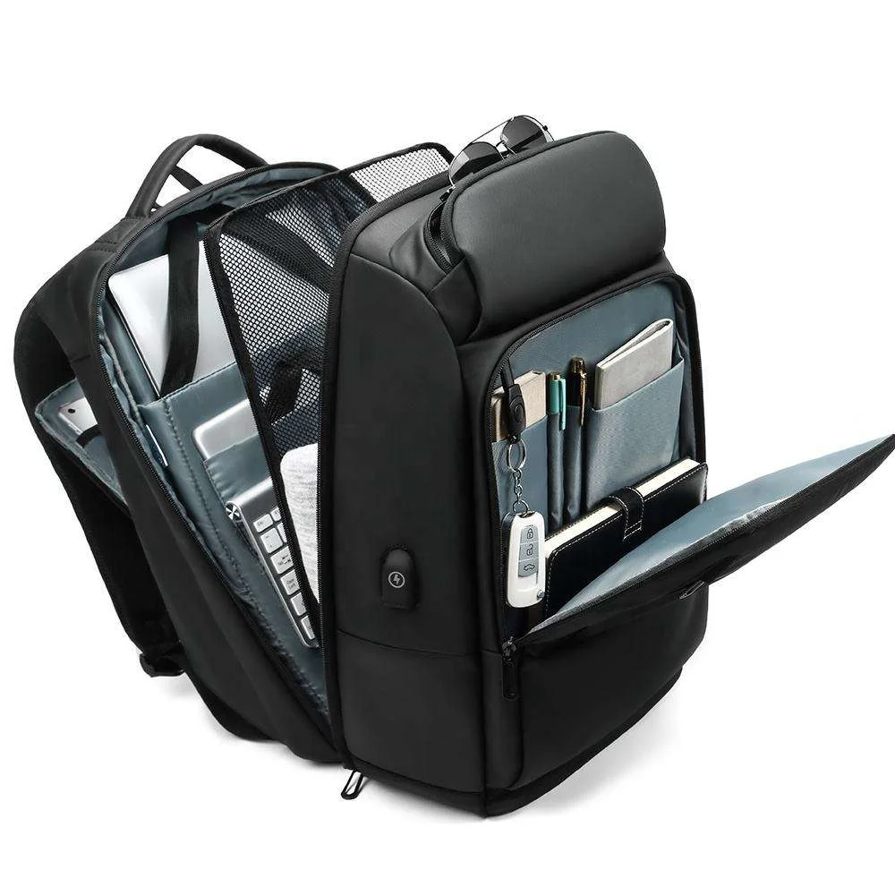 Geestock USB شحن كمبيوتر محمول للأعمال على ظهره متعددة جيوب سعة كبيرة حقيبة السفر مقاوم للماء موضة الرجال على ظهره