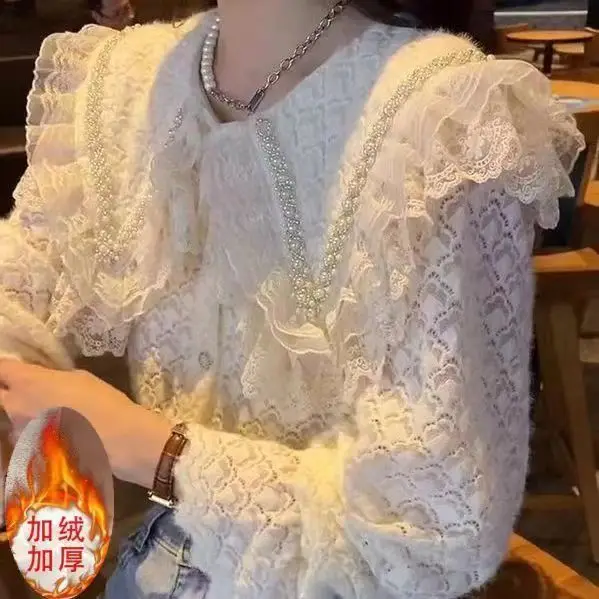 

2025 French new sweet wind fashion crochet hollow lace bottoming shirt doll collar autumn and winter top