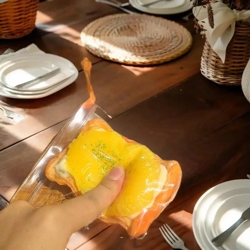 Brinquedos de pelúcia feitos à mão de tarta de ovo de milho de uma peça; Adereços de apertar para redução de estresse para jogos musicais infantis