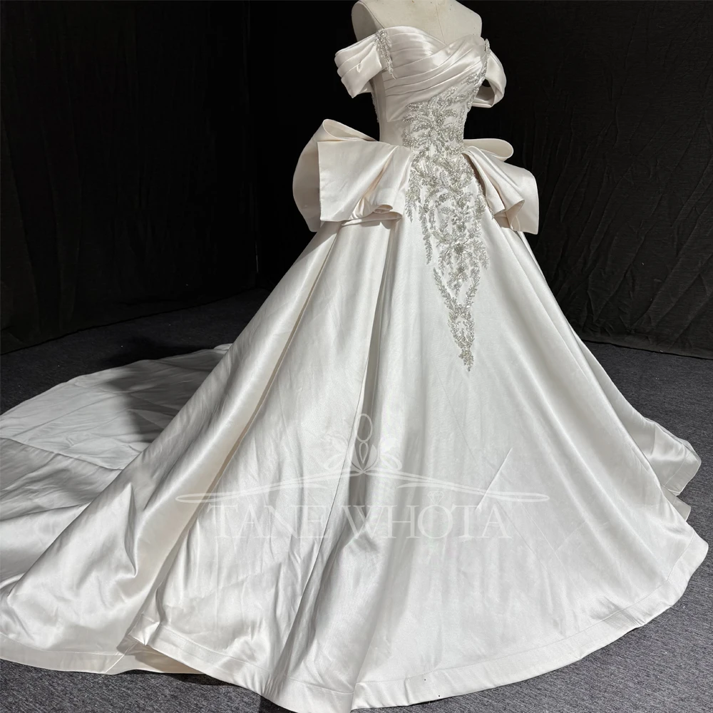 

2025 Милое свадебное платье с открытыми плечами, расшитое бисером, рюшами и блестками, на шнуровке сзади и бантом, настраиваемое платье крест-накрест De Mariage