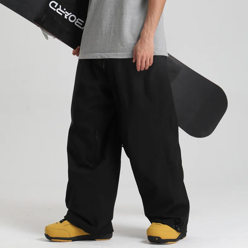 2025 nuovi uomini antivento solidi pantaloni da sci da donna impermeabili larghi larghi con cappuccio sci strides sport all'aria aperta pantaloni traspiranti per adulti