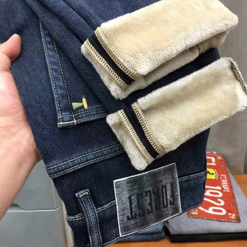 Winter fleece jeans men's 2025 high-end trend stretch slim fit small straight tube cold resistant and warm long pants