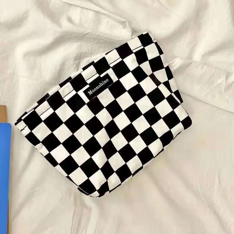 Borsa per il trucco design di nicchia originale strisce di temperamento in bianco e nero arte retrò elegante mano in mano con borsa per il trucco