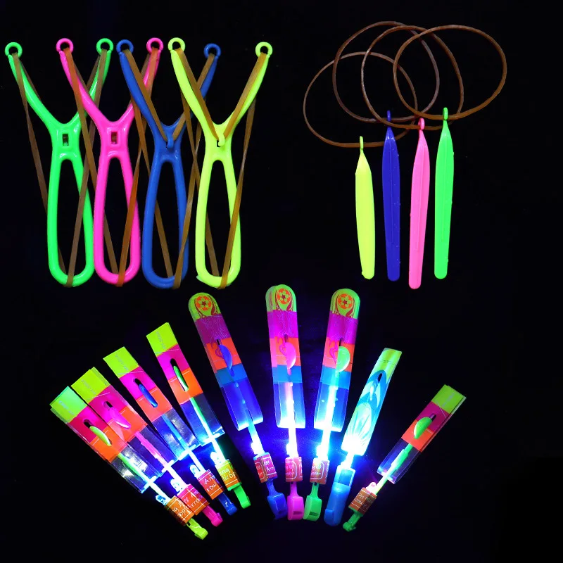 5Pcs Amazing Light Arrow Rocket Helicopter Flying Light Glow In The Dark Party Fun Gift Rubber Band Catapult