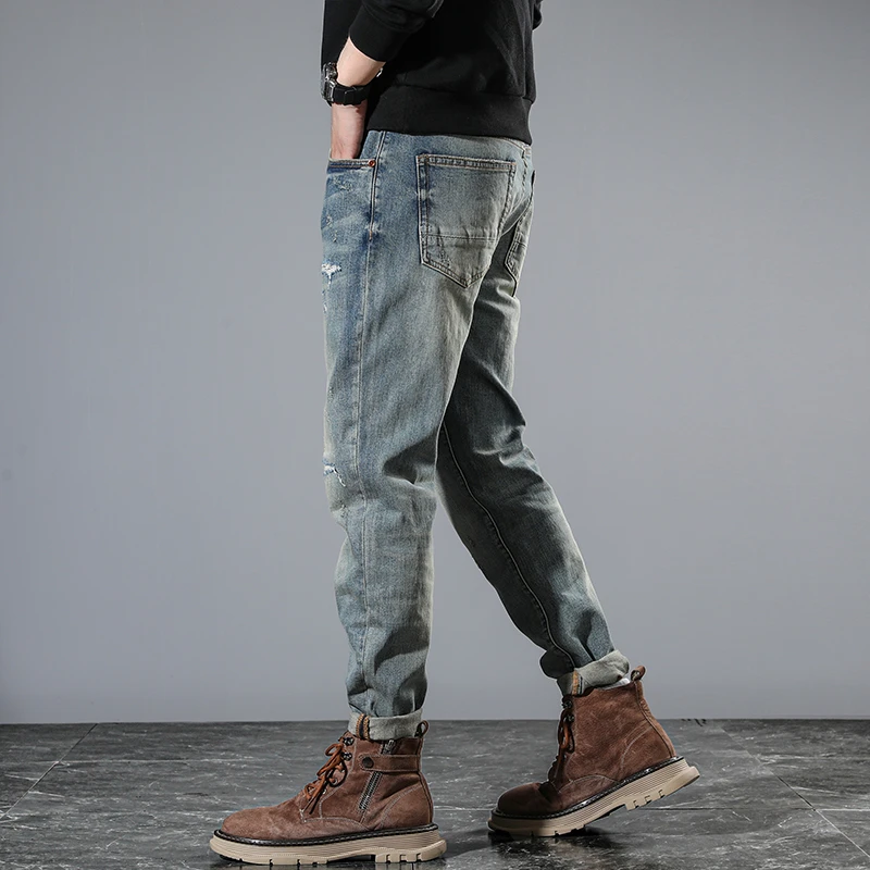 2024 new high-end retro blue old men's jeans influx of Slim straight light blue hole with small feet beggar trousers man