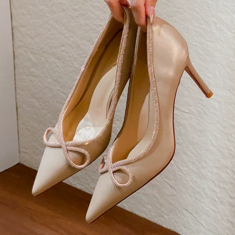 Spring and summer pointed shallow mouth sexy rhinestone bow silk single shoes banquet dress side empty high heels women's sandal