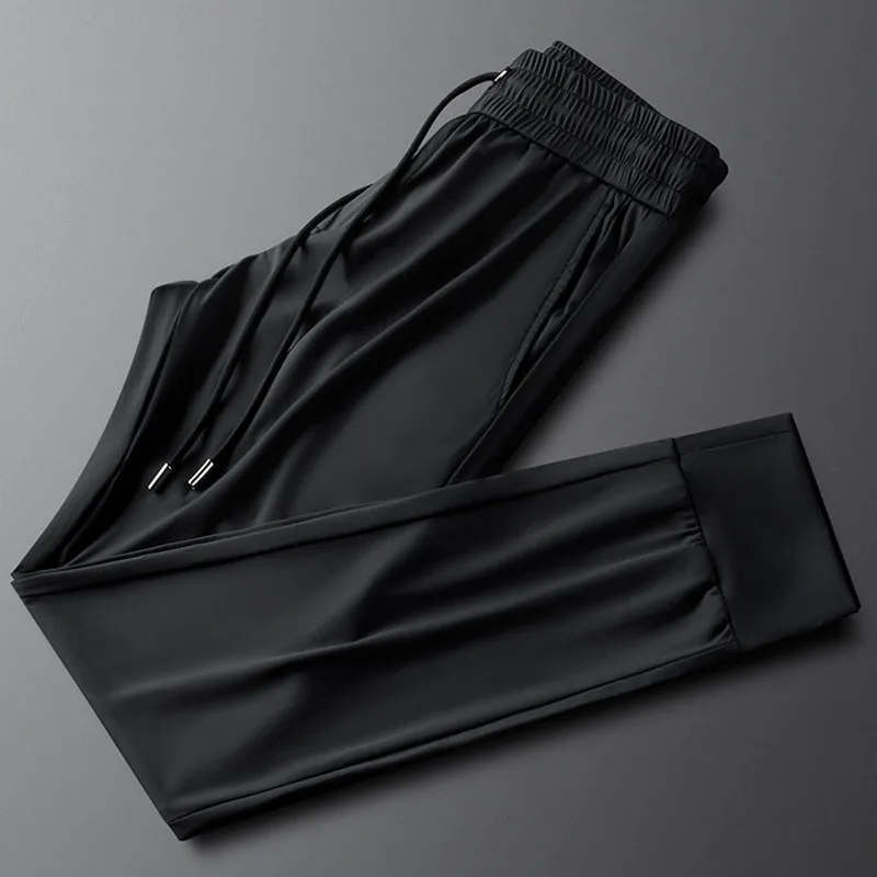 2024 spring new elastic thin casual sports pants men slim girded feet men ice silk sweatpants