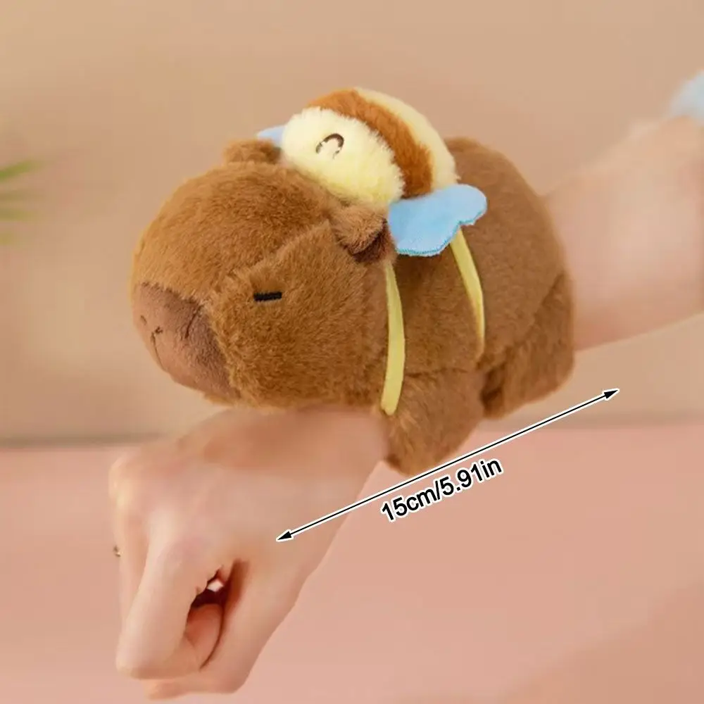 Braccialetti schiaffo capibara di peluche creativi Bambole di pezza di cartone animato Anello applauso animale Giocattolo interattivo per regalo per bambini