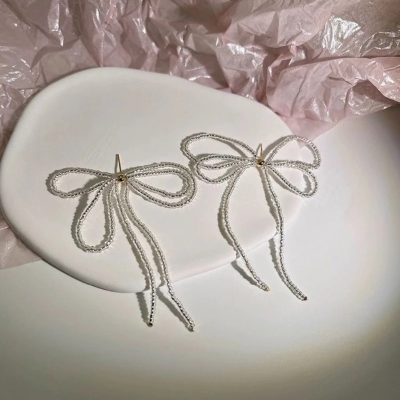 ترصيع أذن بعقدة فراشية للنساء والفتيات ، خرزات شرابات كورية ، أقراط متدلية على شكل قوس ، هدية مجوهرات الزفاف ، شريط رائع حلو