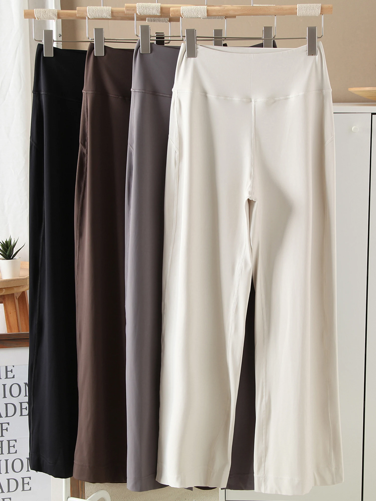 Spodnie damskie z wysokim stanem i szerokimi nogawkami, luźny krój, styl casual, model 2025, szybkoschnące, idealne do biegania i fitnessu, długie spodnie o spódnicy, elegancki krój.