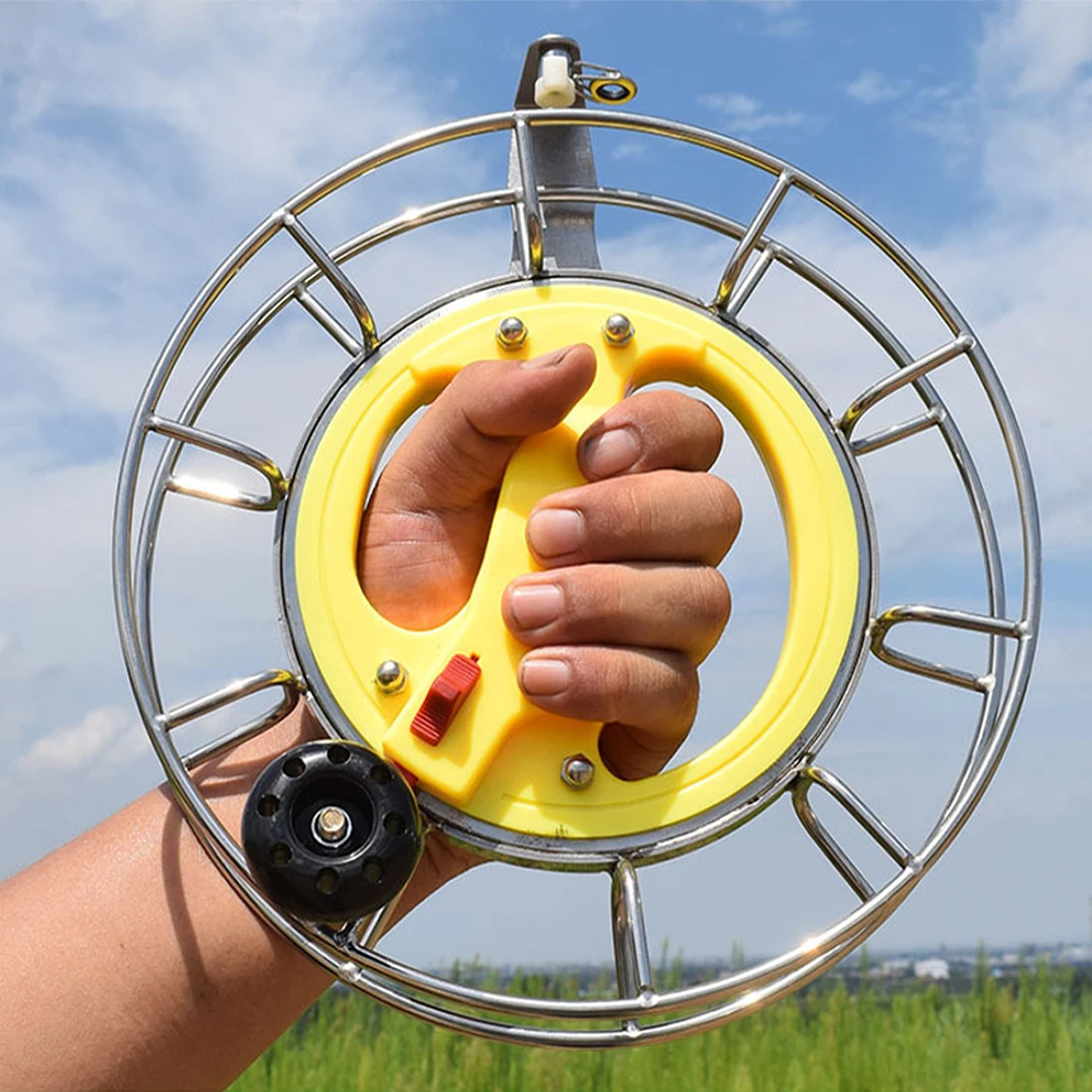 รอกชักว่าวสแตนเลสสตีลกลางแจ้งล็อคได้9กม. 25ซม. อุปกรณ์เสริมการบินพร้อมสายว่าวเคฟลาร์1000ft/304ม.