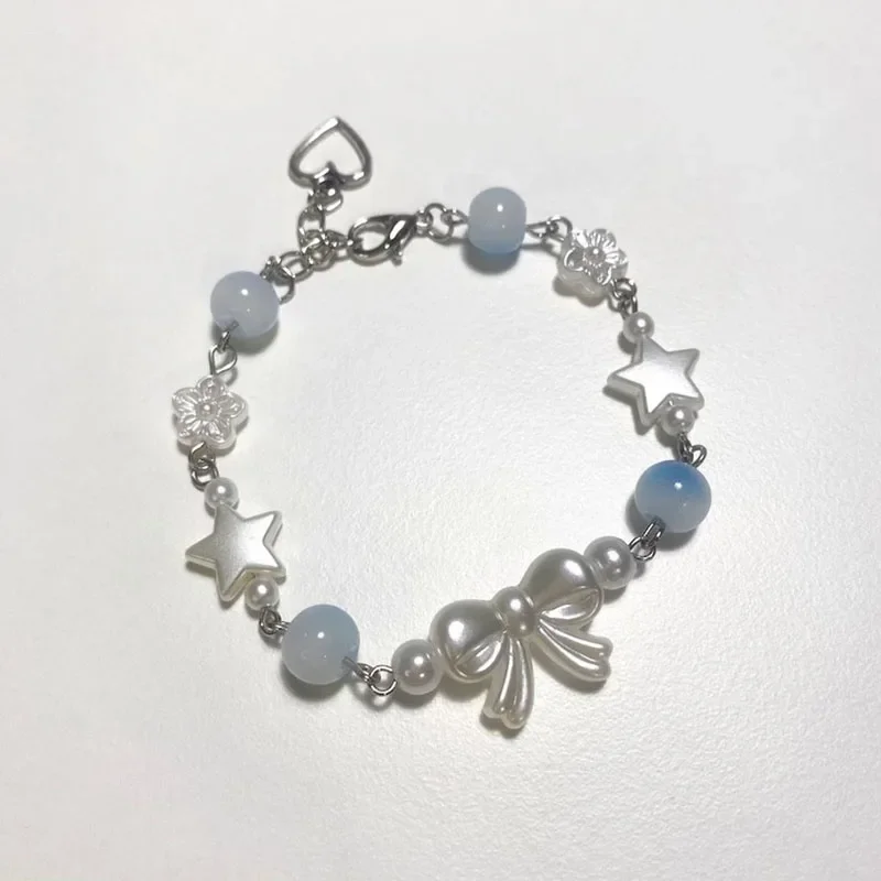 Handmade Coquette bracelet/Friendship jewelry/Beaded bow imitation pearl jewelry/Minimalist jewellery/Star charm beads/Gift idea