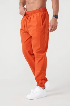 メンズ速乾性スポーツパンツ,伸縮性のある足,オレンジ,ランニング,エクササイズ,ルーズ,レジャー,春と秋,新品