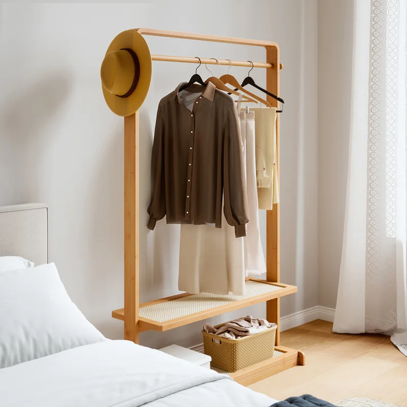 

Modern simple household coat rack Floor-to-ceiling bedroom hanger Mobile storage clothes rack Bed and breakfast bedside rack