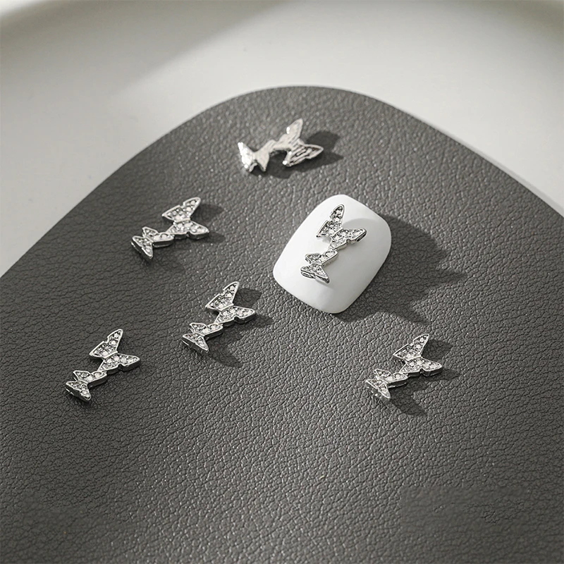 10 pçs diy decoração da arte do prego 3d prata borboleta brilhante strass brocas de unhas para manicure design acessório