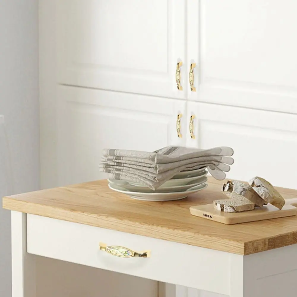 

Zinc Alloy Gold Kitchen Cabinet Handle Light Luxury Modern Ceramic Drawer Pulls Elegant European Stylish Design