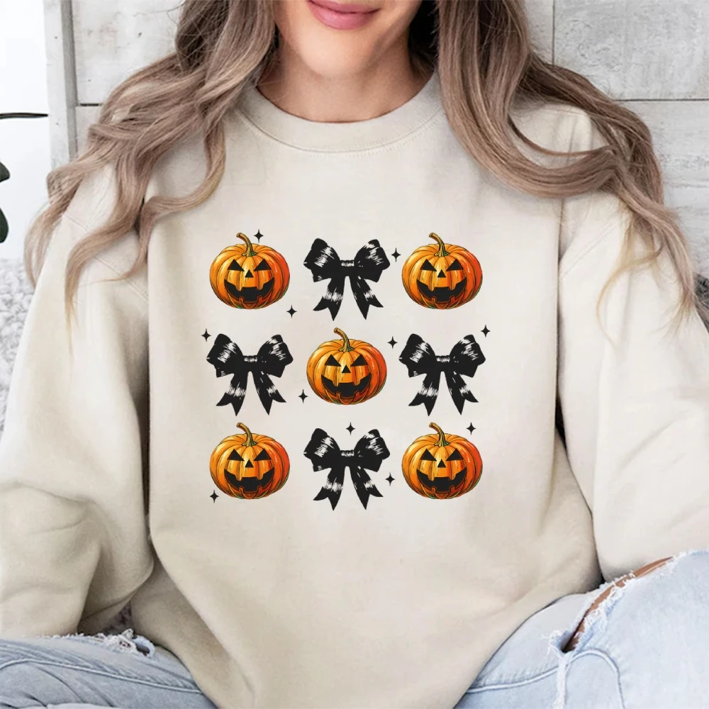 

Fall Coquette Bow Pumpkin Face Women's Halloween Sweatshirt Cute Halloween Spooky Season Fall Graphic Funny Long Sleeve Top