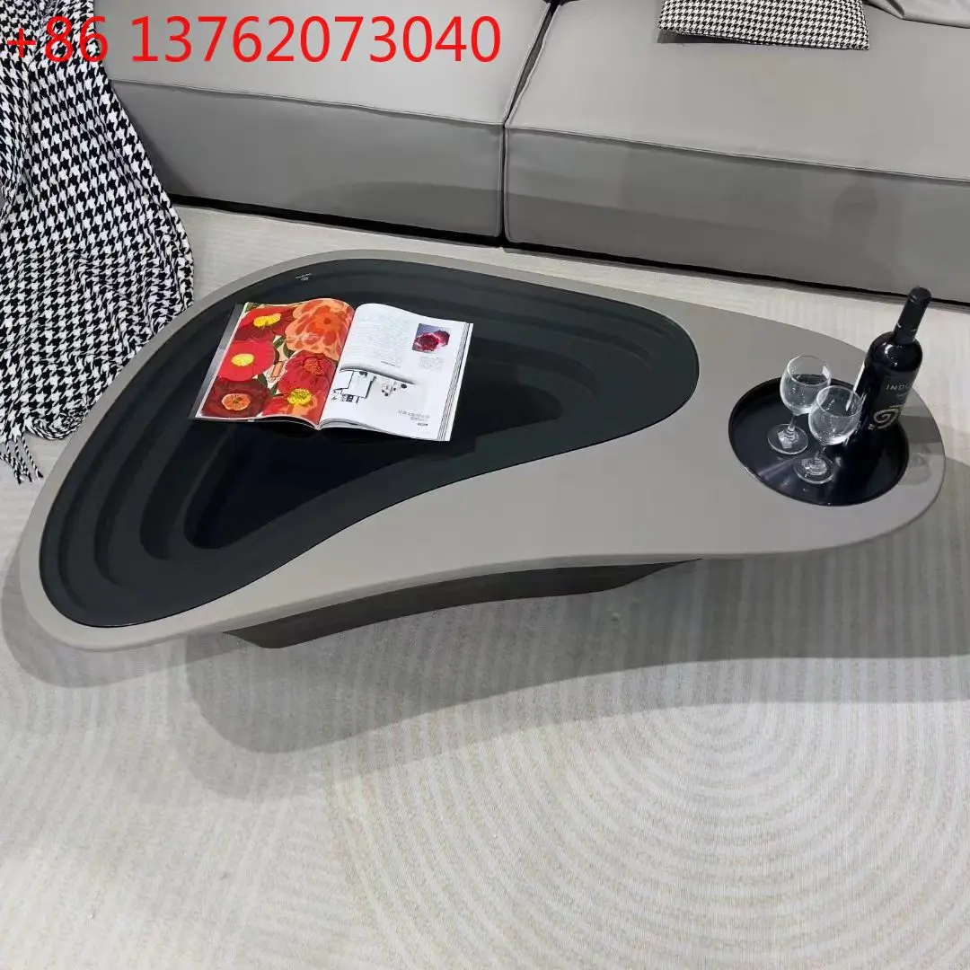 

Легкий роскошный итальянский минималистичный современный простой новый журнальный столик специальной формы для творчества