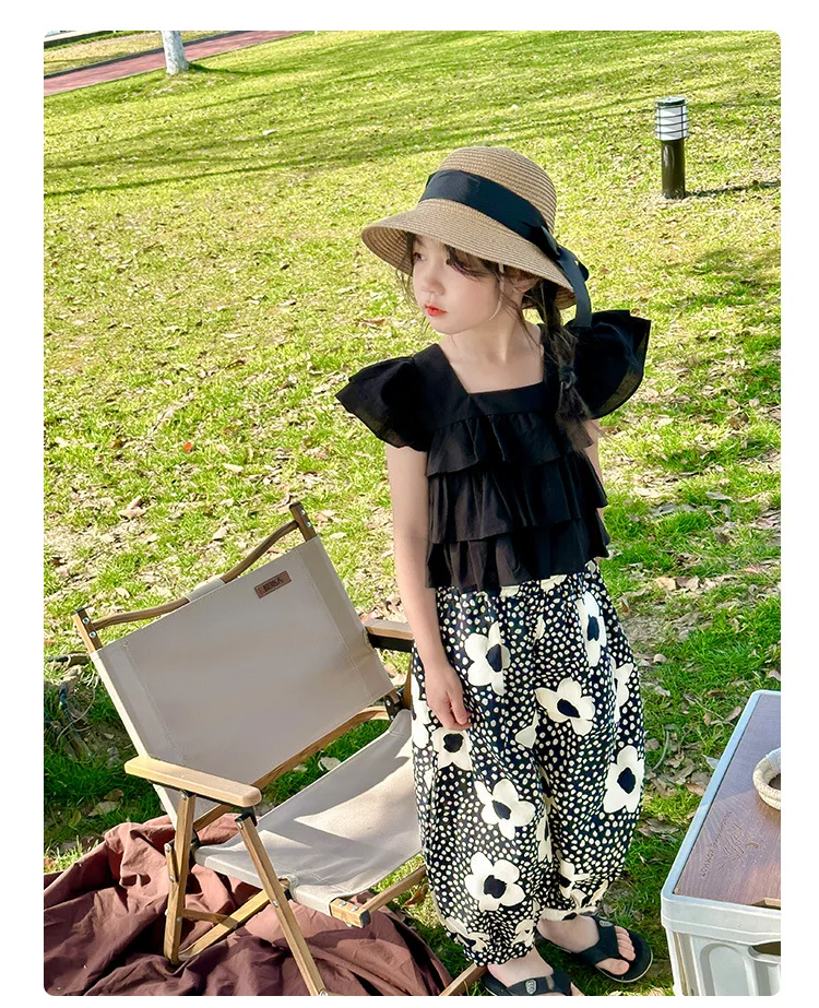 

2024 Summer Child Clothes Sets Sleeveless Ruffles Black Tops Print Floral Pants 2 Piece Sets Designer Girls Clothes Sets 18M-7T