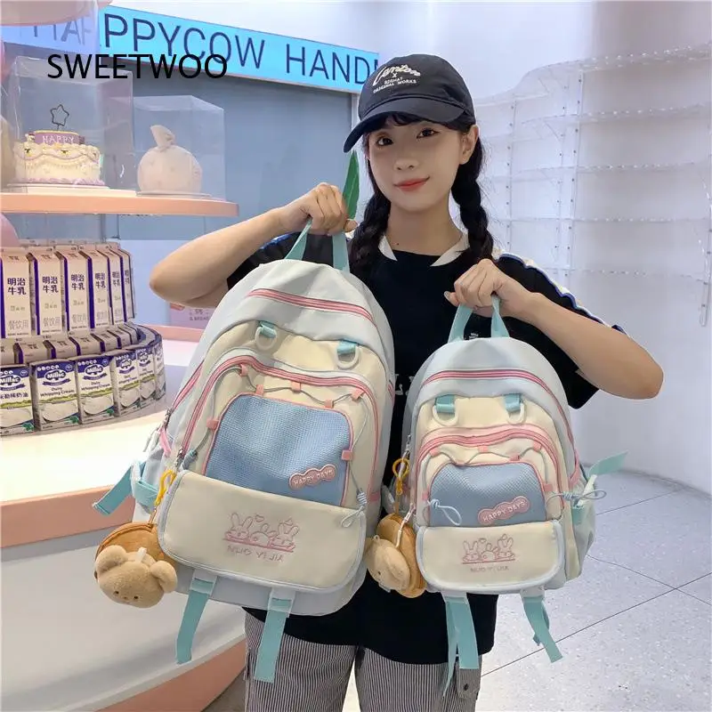Cute Color Block Backpack Large Capacity Multi Pocket School Backpack For Teen Girls Casual Travel Daypack With Plush Pendant