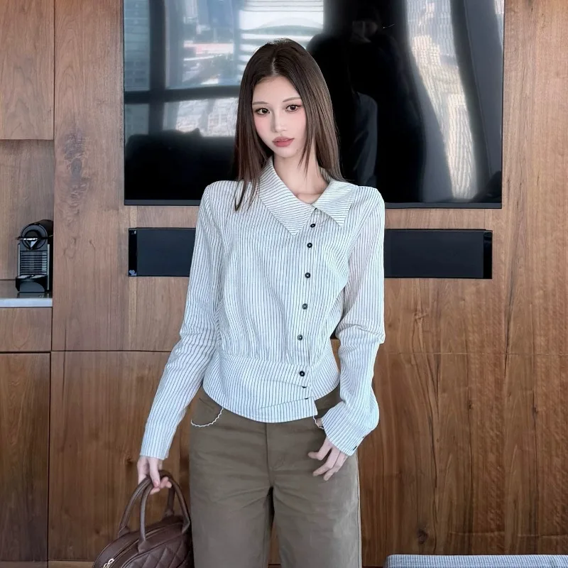 

Spring Women's 2026 New Striped Waist Shirt Slimming and Versatile Lapel Irregular Waist Shirt Diagonal Placket Temperament Tops