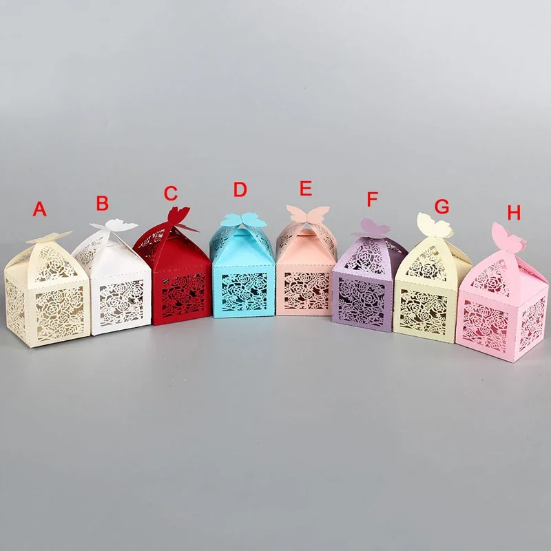 

Free shipping Hollow Out Candy BOX Butterfly Pearl Paper Gift Boxes Wedding Party Favor Decoration With Ribbon 50pcs/lot