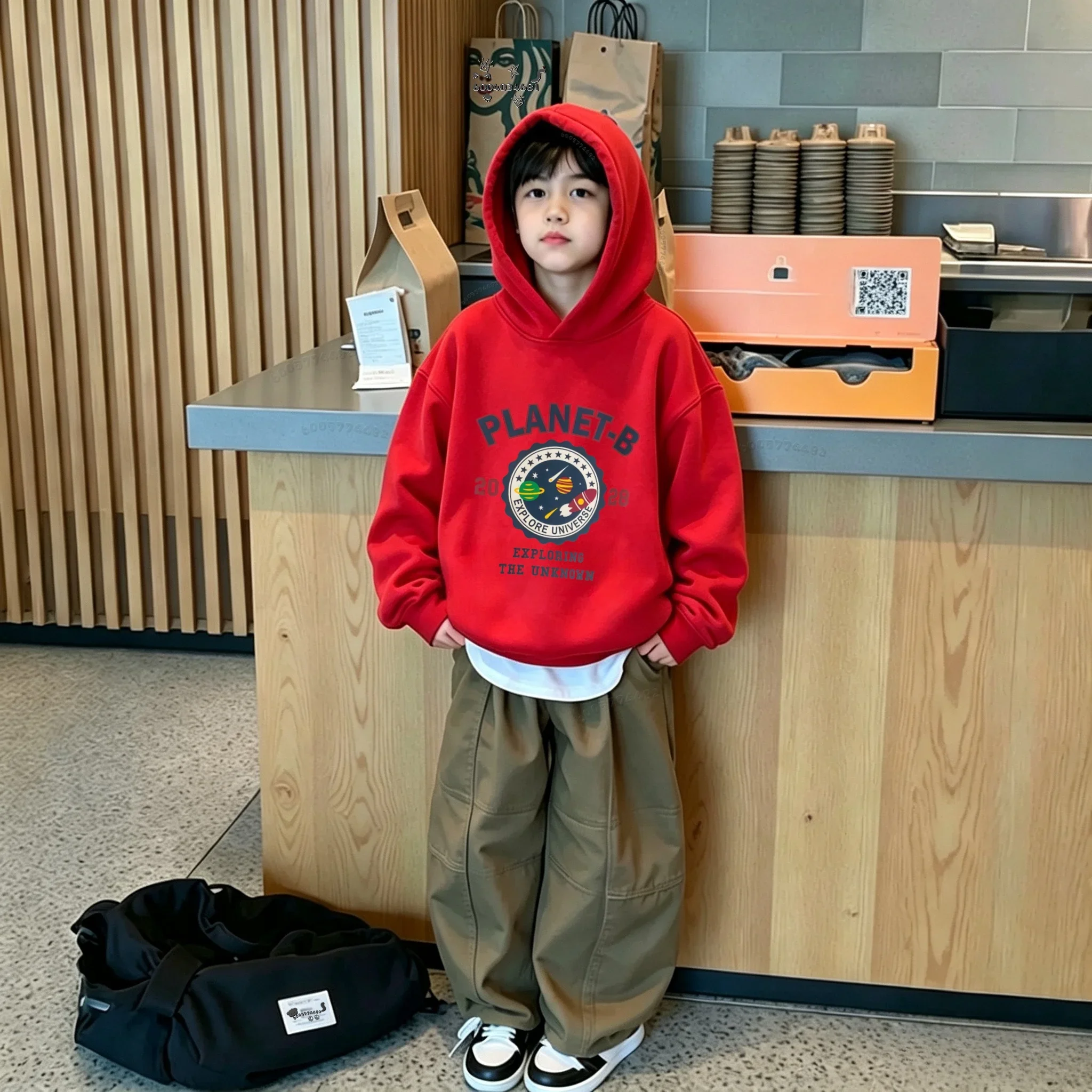 Children's hooded sweatshirt featuring 